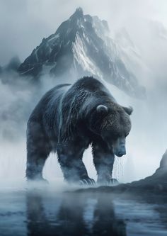 a large bear walking across a body of water next to a tall mountain covered in snow