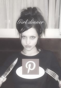 a woman holding a knife and fork with the word girl dinner on it