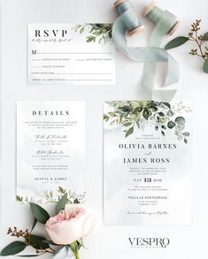 wedding stationery with greenery and ribbon