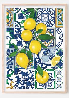 a painting of lemons on a blue and white tile wall with green leaves in the center