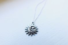 "Celestial sun & moon necklace Sterling dipped raw pewter sun & moon charm size: 21x19mm on a dainty silver plated chain Your choice of a choker necklace, 13 inches with a 2 inch adjustable extender chain (15 inches full length) or an 18\" necklace Customized sizes are available upon request! Handmade with love by Amanda Rose Gift wrapping can be purchased at checkout!! **please read my shop's policies** Thanks for viewing! ❤️" Adjustable Celestial Jewelry With Sun Design, Adjustable Celestial Sun Design Jewelry, Silver Celestial Necklace With Sun Design, Round Adjustable Necklace With Sun And Moon Design, Adjustable Round Sun And Moon Design Necklace, Everyday Adjustable Sun And Moon Design Necklace, Adjustable Celestial Moon Charm Necklace, Adjustable Celestial Pendant Charm Necklaces, Minimalist Adjustable Sun And Moon Jewelry