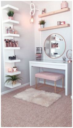 a white desk with a mirror and shelves on it in front of a pink rug