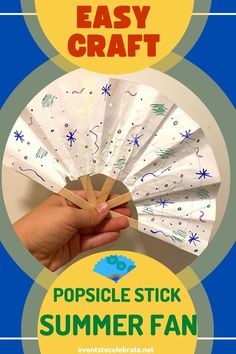 a hand holding a paper fan with the words popsicle stick summer fan on it