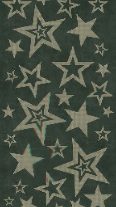 the stars are all different colors and sizes on this black background, but they appear to be made out of paper