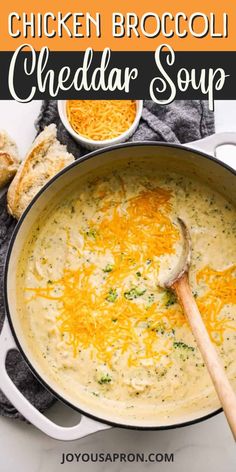 chicken broccoli cheddar soup in a pot with bread on the side