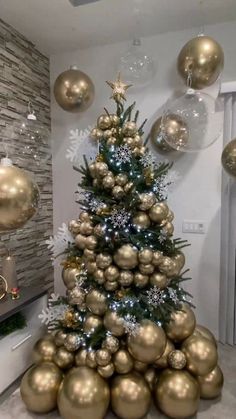 a christmas tree made out of gold balls