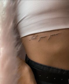 a woman's stomach with writing on it that says, i am your power