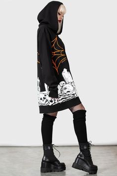 PUMPKIN.- Soft, light stretch cotton.- Statement, all-over, contrasting custom print.- XL hood with drawstring.- Long, cuffed sleeves.- Fitted.- Unisex, so it's for everyone.Model with blonde hair is 5ft 4 and wears a size L for an oversized look.Model with ear stretchers is 6ft 1 and wears a size L.with KILLSTAR branding, 100% Cotton. Spooky Black Streetwear Hoodie, Spooky Black Hoodie For Streetwear, Alternative Style Cotton Hoodie For Fall, Alternative Cotton Halloween Hoodie, Black Halloween Hoodie With Drawstring, Spooky Fall Streetwear Hoodie, Cotton Halloween Hoodie With Adjustable Hood, Halloween Cotton Hoodie With Adjustable Hood, Halloween Cotton Sweatshirt With Drawstring Hood