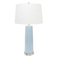 a blue table lamp with a white shade on the base and a silver metal base