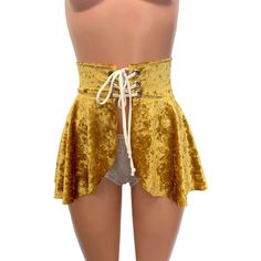 Our newest skirt style! We are in love with this lace-up, open-front mini skirt in gold crushed velvet spandex with white ties/laces. The tie-up front offers an adjustable fit and the sexy skirt is flowy and fun. If you'd like a different lace/tie than shown in the photo, please tell us in the "personalization" box. Open Front Skirt, White Ties, Corset Skirt, Lace Tie, Rave Outfit, Festival Clothing, Performance Wear, Velvet Lace, Rave Wear