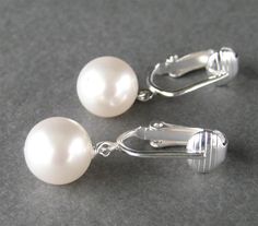 Round Pearl Clip On Earrings Silver Ear Clips White by Tissage, $7.00 White Gold Clip-on Pearl Earrings, Classic White Clip-on Pearl Earrings, White Pearl Clip-on Earrings, Cheap White Pearl Clip-on Earrings, Affordable White Pearl Clip-on Earrings, Bridal Clip, Earrings Classic, Ear Clips, Classic Earrings