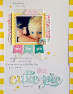 a scrapbook page with an image of a mother and her baby in the center