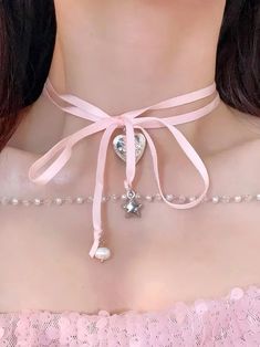 𝔇𝔢𝔱𝔞𝔦𝔩𝔰: Style: Coquette, Kawaii, Egirl Materials: Ribbon & Metal Quantity: 1 pc (As shown) This is a cottage core ribbon choker that features the lace up style & cute star & pearl beads pendants Solid quality with durable material. Adjustable to your neck size Enjoy free shipping with a purchase of over 80$ Kawaii Egirl, Coquette Kawaii, Star Pearl, Pink Choker, Ribbon Choker, Pretty Jewelry Necklaces, Cute Star, Ribbon Necklace, Cute Stars