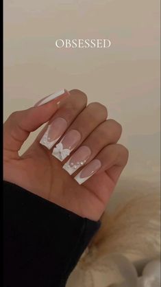 New Years Nail Inspo Simple, French Tip Nails With Design And Charms, French Tips Square With Design, Plain White Nails With Rhinestones, Elegant White Nails Classy, White French Nail Designs Classy, White Christmas French Tip Nails, White French Tips With Bows, Nail Inspo With Bow