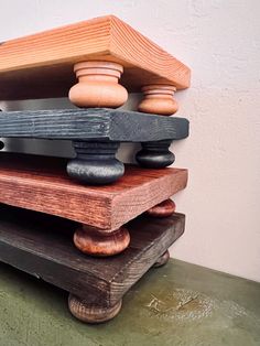 a stack of wooden pieces sitting on top of each other