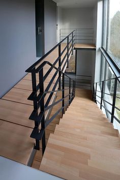 the stairs are made of wood and metal