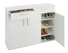 a white cabinet with two doors and some shoes