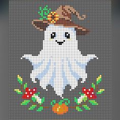 a cross stitch pattern with a ghost wearing a hat