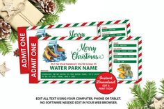 two christmas water park ticket cards next to pine cones and evergreen branches with presents on them