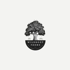 a black and white logo for a farm with an oak tree on the front, and words wildroot farms above it