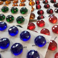 many different colored stones are on display for sale at the store, and there is no image here to provide a caption