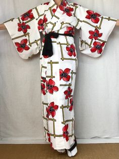 A cute vintage Yukata Kimono dress from Japan.  Made of light cotton for warm summer days.  Wear this as a dress, robe, beach cover or dressing gown.   Fits a women's size S. MATERIAL:  100% Cotton.  Unlined. PATTERN:  Oversized flowers and lattice. Color:  White with black, red & yellow design. CONDITION:  Used vintage.  A few light stains (see photos). Sash NOT included. Kimono sash sold separately. My shop: https://kimonomemoirs.etsy.com. SIZE: Women's SMALL Kimono. Wingspan- 49 inch (124.5 c Historical Kimono, White Yukata, Yukata Women, Japanese Wedding Dress, Oversized Flowers, Floral Dress Long, Red Kimono, Japanese Clothing, Yukata Kimono