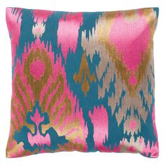 a pink, blue and gold pillow with an abstract design on the front cover is shown