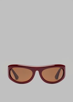 Color: Burgundy Acetate/Tobacco Lens Safaa, derived from the Arabic word for “purity", speaks to the harmony and virtue of form itself. This frame is composed of smooth, unbroken lines that empower the wearer with a lucid view of their surroundings. Enveloping wrap around mask frame Designed for a comfortable unisex fit Handcrafted in Japan with complete cellulose acetate Provides 100% UVA/UVB protection Features the emblematic six-point arrow steel rivets Includes a premium case with protective PU leather pouch and cleaning cloth By Port Tanger. Made in Japan Japan Woman, Cellulose Acetate, Leather Pouch, Rivets, Cleaning Cloth, Frame Design, Wrap Around, Sunglasses Accessories, Pu Leather