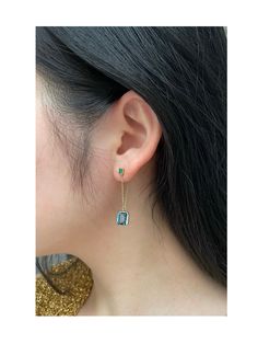 These beautifully handcrafted earrings are classics from our collections. An elegant and modern colour combination of Emerald and London Blue Topaz will surely enchant you. This pair perfectly exudes our modern and whimsical aesthetic. Measuring approximately two inches long, they frame your face gracefully. Masterly h Formal Dangle Gemstone Linear Earrings, Formal Gemstone Dangle Linear Earrings, Elegant Gemstone Linear Earrings As Gift, Elegant Sterling Silver Gemstone Linear Earrings, Elegant Single Blue Earring, Elegant Dangle Linear Earrings With Gemstones, Elegant Gemstone Dangle Linear Earrings, Luxury Long Drop Linear Earrings As Gift, Elegant Gemstone Linear Dangle Earrings