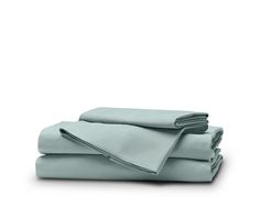 the sheets are folded and ready to be used in this bedding set, which is light blue