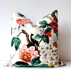 an image of a pillow with flowers on it