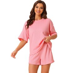 Elevate your lounging experience with the Cheibear Women's Lounge Outfits. This pajama set, featuring a casual round neck top with short sleeves and matching shorts, is crafted from a soft blend of 95% Polyester and 5% Spandex, ensuring both comfort and breathability. The ribbed, solid color design adds a touch of simplicity and style to your relaxation time.

- Material: 95% Polyester, 5% Spandex
- Color: Pink
- Gender: Female
- Size: Small

Ideal for various leisure activities, from sleeping a Comfortable Solid Color Sets For Pajama Party, Comfortable Pink Pajama Shorts For Relaxation, Spring Sleepwear For Relaxing At Home, Summer Cotton Sleepwear For Relaxing At Home, Solid Crew Neck Sets For Loungewear, Casual Ribbed Sets For Loungewear, Comfortable Pink Sleepwear With Soft Texture, Solid Ribbed Loungewear Set, Cozy Sleepwear For Loungewear