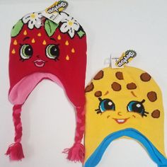 Shopkins Red Strawberry Kiss Hat Cap Beanie New With Tags And Shopkins Yellow Kooky Cookie Hat Cap Beanie New With Tags Sold Together As A Bundle For Only $8. Buy Both Now And Save!! This Listing Is For The Bundle. To Buy Just 1 Hat, Please Check Out My Closet For The Individual Listing. Thanks!! Cutecore Wishlist, Cookie Strawberry, Fruit Hat, Zombie Clothes, Girl Hats, Fleece Tie Blankets, Funky Shirts, Tie Blankets