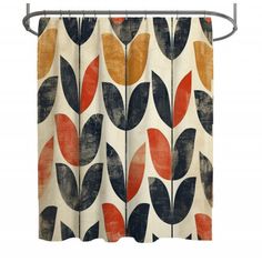 a shower curtain with an orange and black leaf pattern on the outside, hanging from a metal rod