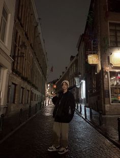 a person standing in the middle of an empty street