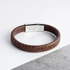 Let me introduce you to our men's bracelets! Known for its premium quality and beautiful and sturdy appearance, this bracelet provides you with a unique way to express your love and adoration for your boys, dads and male friends. Whether as a fashion accessory or a personalized gift, our men's bracelets are perfect. This bracelet is made from the highest quality materials and exquisite craftsmanship, ensuring high quality and durability of the product. Each link is carefully polished and treated to reveal exquisite detail and solid construction. Our men's bracelets are a great gift option for boyfriends, dads and male friends. Whether it's a birthday, anniversary, Father's Day, or another special occasion, this bracelet will express your love and appreciation for them. Let them feel your c Engraved Stainless Steel Bracelets For Promise, Everyday Engraved Brown Bracelets, Engraved Stainless Steel Promise Bracelets, Stainless Steel Engraved Bracelet For Promise, Engraved Stainless Steel Bracelet Gift, Engraved Stainless Steel Promise Bracelet, Everyday Brown Engraved Bracelets, Masculine Bracelets For Father's Day Gift, Silver Engraved Leather Bracelets For Father's Day