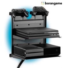 two video game controllers sitting on top of each other