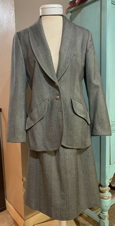 LANVIN Paris Vintage Houndstooth Wool Pencil Skirt Jacket Women’s Suit Size 44. Condition is "Pre-owned". Shipped with USPS Priority Mail. See pictures for details. NOTE! It is missing a button on the jacket. I checked my closets over and over for it but did not find it. See pictures! Classic Tailored Wool Skirt Suit, Tailored Skirt Suit With Pockets For Work, Classic Wool Skirt Suit For Work, Classic Wool Long Sleeve Skirt Suit, Fall Business Skirt Suit, Classic Winter Skirt Suit For Career, Classic Tailored Skirt Suit For Fall, Classic Skirt Suit With Pockets For Work, Classic Fall Office Skirt Suit