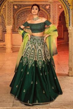 Emerald green lehenga with all-over embroidery. Comes off shoulder blouse and shaded dupatta.
Component: 3
Pattern: Embroidery
Type Of Work: Beads, Sequin, Thread, Cutdana
Neckline: Off Shoulder
Sleeve Type: Short
Fabric: Raw Silk, Chanderi and Organza
Color: Green
Other Details: 
Shaded dupatta with embroidered border
Occasion: Bride - Aza Fashions Emerald Green Lehenga, Shaded Dupatta, Chanderi Lehenga, Indian Outfits Modern, Raw Silk Embroidery, Embroidery Beads, Lehnga Dress, Green Lehenga, Lehenga Blouse