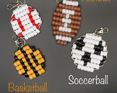 three beaded football keychains are shown in different colors