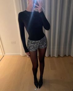 SARAH ASHCROFT on Instagram: "Short shorts ✨" Nye Outfit Inspo New Years, Stocking And Shorts Outfit, Sparkly Shorts Outfit New Years, Silver Sequin Shorts Outfit, Winter Short Outfits, Sparkly Nye Outfit, Micro Shorts Outfits, Paris Clubbing Outfit