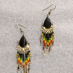 These Are Lightweight Beaded Earrings Pierced With Yellow, Red,Green, And Black Beads. Smoke Free And Animal Free Home. Bundle Up 2 Or More Items For Better Discounts. No Trades. Reasonable Offers Accepted. Adjustable Beaded Earrings With Beaded Chain For Festivals, Festival Beaded Earrings With Adjustable Chain, Festival Beaded Earrings With Beaded Chain, Multicolor Beaded Chain Earrings For Festival, Adjustable Beaded Chain Earrings For Festivals, Black Bead Dangle Earrings For Festivals, Adjustable Dangle Earrings With Beaded Chain, Adjustable Black Beaded Earrings For Festival, Yellow Beaded Metal Jewelry