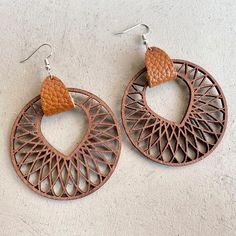 Elevate your style with our Beautiful Large Wood and Leather Earrings. Crafted with care, these unique earrings are perfect for making a statement, featuring a combination of natural wood and leather that adds a touch of rustic and sophisticated charm to your outfit. 3 inches in diameter Boho Beauty, Book Jewelry, Yellow Earrings, Holiday Jewelry, Wooden Earrings, Wood Earrings, Leather Necklace, Leather Wraps, Boutique Jewelry