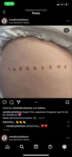 the back of a woman's stomach with words written on it