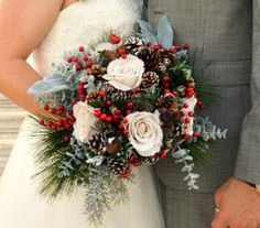 a bride and groom standing next to each other