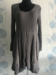 Praechtig Berlin  Pure Silk dress  Taupe Grey  Stitch  Crinkled  Double layered skirt  Size 1= M  Length 42"/ 107 cm (back side)  Pit to pit 19"/48 cm ( unstretched ) Shoulders 17"/ 43 cm Sleeve 25"/ 63 cm  Mannequin size 10 UK Asymmetric front bottom  Top and sleeves are stretching  Beautiful dress in perfect condition  Tracking delivery Flowy Tunic Dress In Lagenlook Style, Long Sleeve Dress With Crinkle Texture For Spring, Long Sleeve Crinkle Texture Dress For Spring, Flowy Lagenlook Long Sleeve Dress, Flowy Lagenlook Dress With Long Sleeves, Flowy Long Sleeve Lagenlook Dress, Summer Long Sleeve Dress With Crinkle Texture, Funky Streetwear, Pure Silk Dress