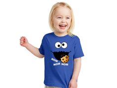 Cookie Monster Sesame Street toddler shirt, available in toddler sizes, if you need a youth size please message me. Digitally printed with water based inks. All shirts are handmade-to-order. If you need customization please send a message. ~Production time is next business day but any questions about customization may cause delay, please be sure to check your etsy messages in case I need to reach out. ~If you have a specific deadline let me know ~Free shipping eligible when you purchase $35 or m Cookie Monster Shirt, Toddler Cookies, Monster Shirt, Birthday Boy Shirts, Birthday Girl Shirt, Team Shirts, Cookie Monster, 8th Birthday, Monster Cookies