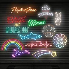 neon signs on the side of a garage door