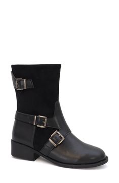 Lofted by a stacked block heel and durable sole, this trend-right boot is the perfect choice to elevate your cold-weather ensemble. 1" heel Side zip closure Synthetic upper/textile lining/synthetic sole Imported Buckle Boot, Buckle Boots, Boot Shoes Women, Mid Calf, Cold Weather, Side Zip, Nordstrom Rack, Knee High, Block Heels