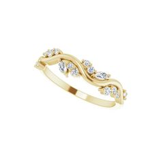 a yellow gold ring with diamonds on it